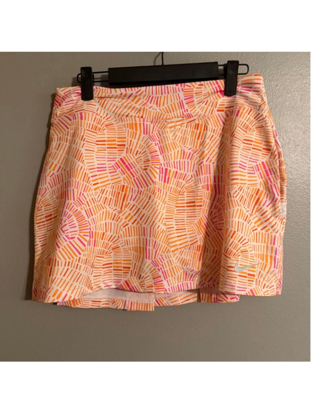 Nike Golf Skort with orange and pink abstract geometric pattern
Size S
#athletic
